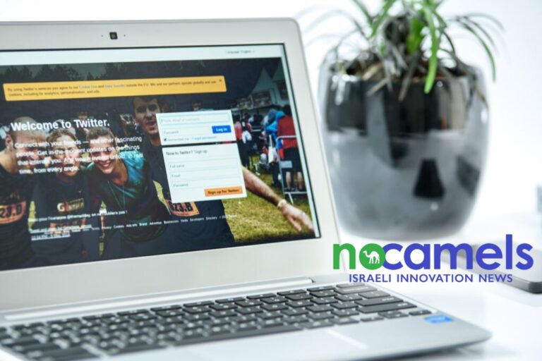 Laptop screen showing Twitter login page with NoCamels Israeli innovation news logo, symbolizing AI efforts to tackle fake accounts and misinformation