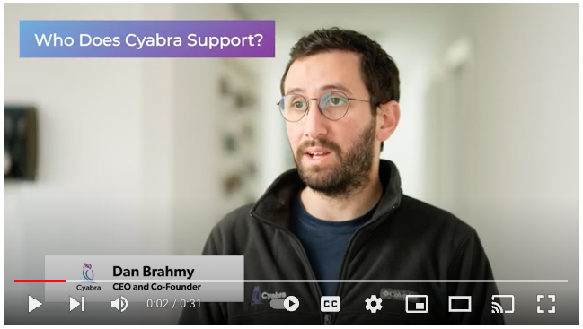 Dan Brahmy, Cyabra’s CEO and co-founder, speaking on camera with a purple banner reading “Who Does Cyabra Support?” in the corner