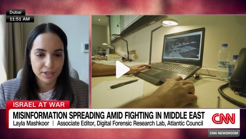 CNN split-screen showing Layla Mashkoor speaking from Dubai while an analyst reviews war-related footage on a laptop, accompanied by the headline 'Misinformation spreading amid fighting in Middle East'