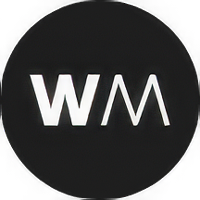 white stylized WM letters on a black circular background