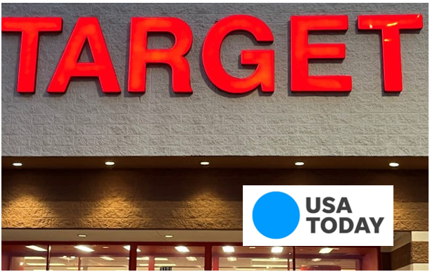 Red illuminated Target sign on store facade at dusk with USA TODAY logo overlay