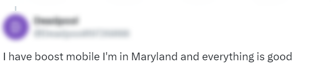 Social media comment reading “I have boost mobile I'm in Maryland and everything is good,” illustrating a user report amid cellular outage discussions