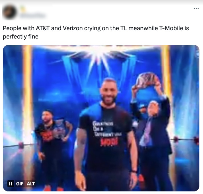 Tweet reading 'People with AT&T and Verizon crying on the TL meanwhile T-Mobile is perfectly fine' paired with a celebratory WWE wrestler GIF symbolizing how T-Mobile customers feel unaffected during the cellular outage